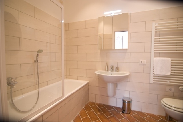 en suite bathroom with bath & integral shower